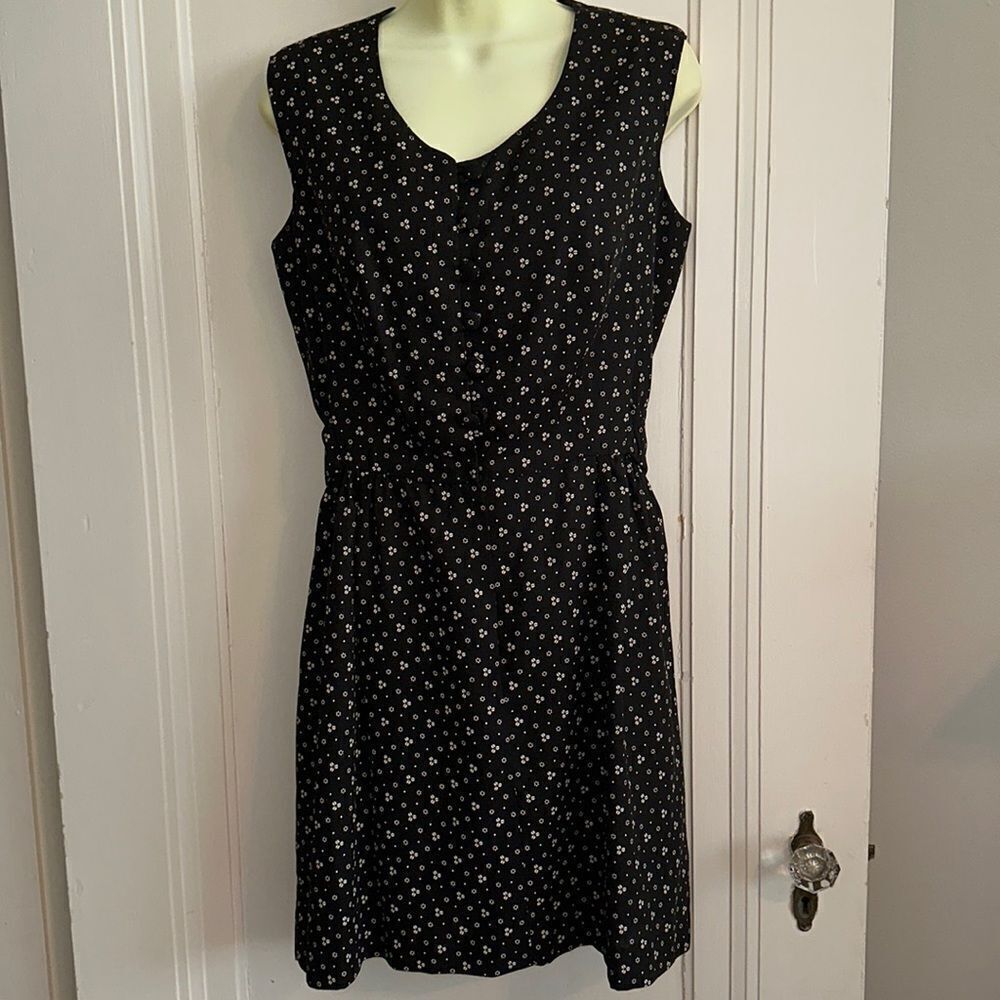 Homemade/handmade black polyester sleeveless dress with‎ white floral print